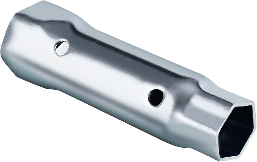 A person using a long socket wrench on the top of a water heater to loosen and remove the anode rod